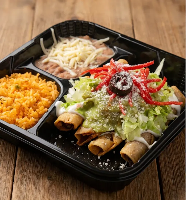 Loaded chicken taquitos plate with rice and beans